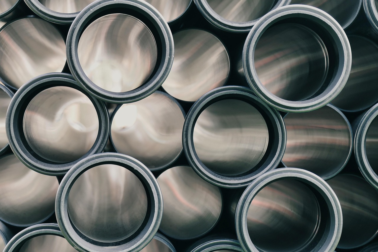 Steel pipe sections stacked end to end